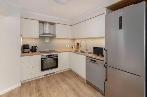 Kuchyň nebo kuchyňský kout v ubytování Apartments Ribnica