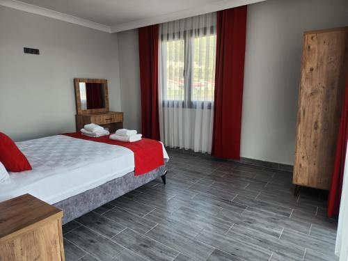 Postel nebo postele na pokoji v ubytování Villa Nur&Doğa