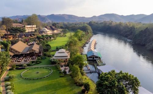 an aerial view of a resort next to a river at Suan Sai Yok Resort in Sai Yok