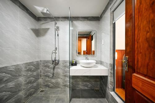 Koupelna v ubytování PLUS VUNG TAU HOTEL