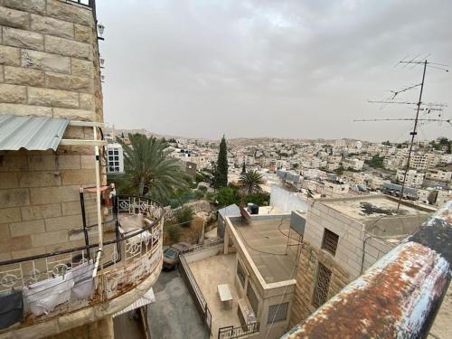 a view of a city from a building at Traditional Palestinian Home in Beit Sahour