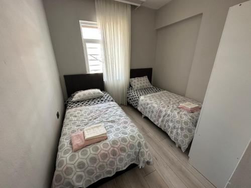 Кровать или кровати в номере 3+1 Furnished apartment close to Konyaaltı beach