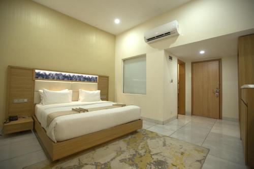 Ένα ή περισσότερα κρεβάτια σε δωμάτιο στο Ibiza Hotel & Resorts