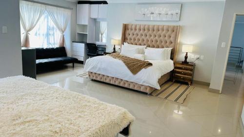 The Hide in Sandtonにあるベッド