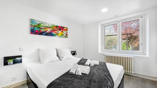Ліжко або ліжка в номері HOMEY COLOR - Proche centre/Parking/Wifi & Netflix