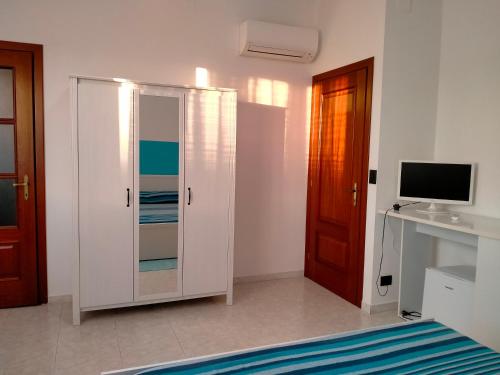 TV a/nebo společenská místnost v ubytování Mare e Sabbia