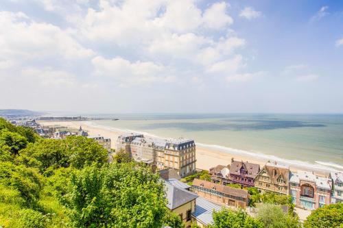 an aerial view of a beach and buildings at Les Tamaris - Studio with Sea View - Trouville-Sur-Mer in Trouville-sur-Mer