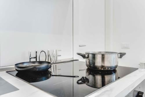 Una cocina o cocineta en VEN93 -Loreto - Duomo- Wifi - Modern - Central