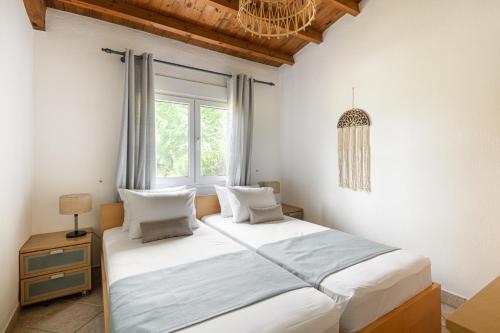 Posteľ alebo postele v izbe v ubytovaní Summer Retreat in Sithonia #FeelsLikeHome