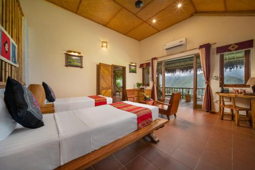 Letto o letti in una camera di Puluong Retreat