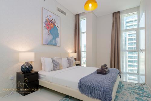 Postel nebo postele na pokoji v ubytování Marco Polo - Exquisite 2 BR with captivating city view & colors