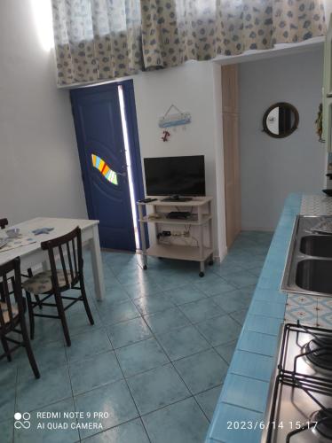 Μια τηλεόραση ή/και κέντρο ψυχαγωγίας στο Appartamento Rocche Rosse
