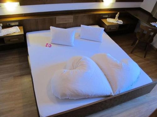 Кровать или кровати в номере Ahrntalerhof