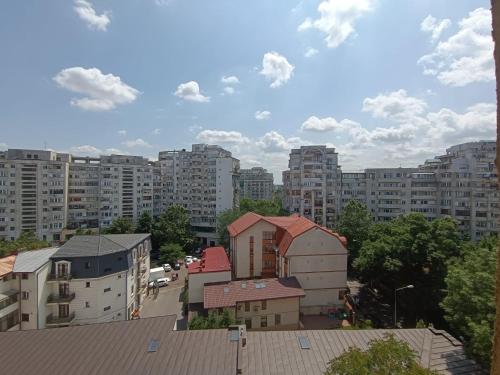 a view of a city with tall buildings at Central Apartments in Bucharest