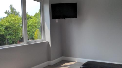 A television and/or entertainment centre at Valley Stream Guest Accommodation