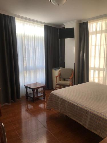 Katil atau katil-katil dalam bilik di Hostal O Portiño