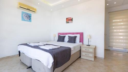 Postel nebo postele na pokoji v ubytování Villa serenity 3