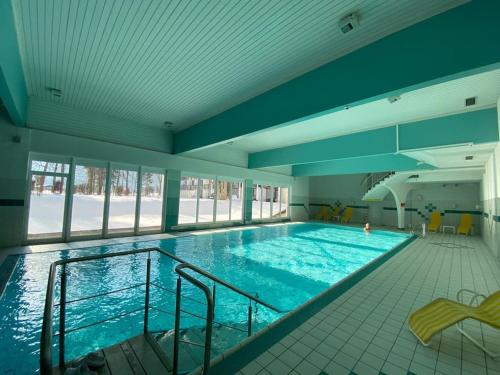 Bazén v ubytování Apartment mit Indoor Pool und Garten nebo v jeho okolí