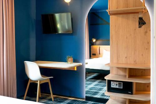 Postel nebo postele na pokoji v ubytování Ibis Styles Colmar Centre