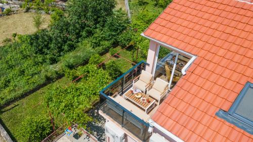 an overhead view of a house with an orange roof at Apartment Petar 2 in Kotor