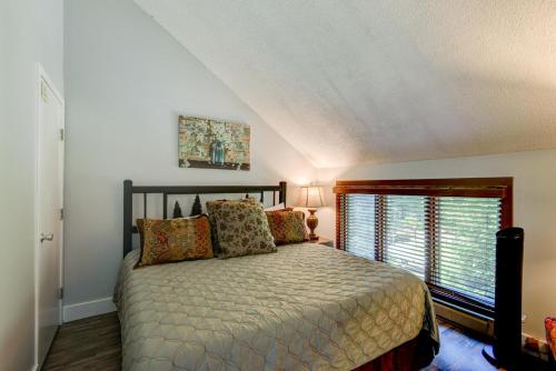 a bedroom with a bed and a large window at Top Of Seven in Seven Devils