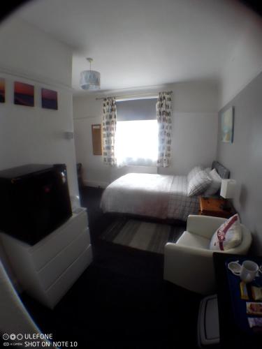 Ένα ή περισσότερα κρεβάτια σε δωμάτιο στο Snowdon House Single rooms for solo travellers