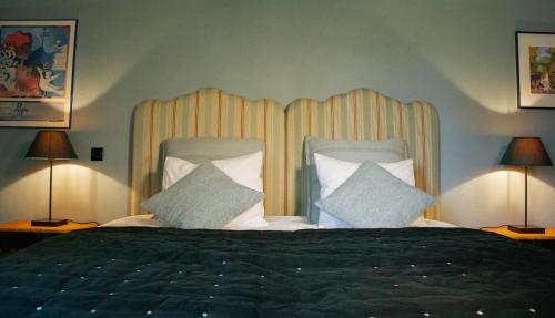 Postel nebo postele na pokoji v ubytování B&B Gutshaus De La Fontaine