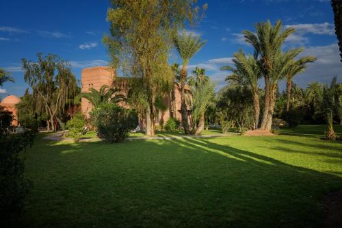 Κήπος έξω από το Villa Al Assala Palmeraie
