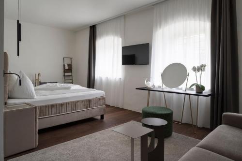 Ansitz Battisti Suitesにあるベッド