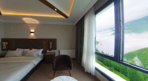 Cama o camas de una habitación en SIRT BUTİK HOTEL