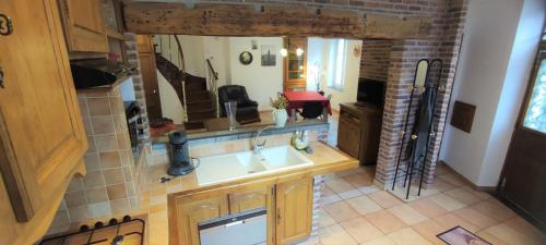 an aerial view of a kitchen with a sink at Le haut clocher in Fumay