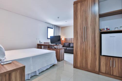 Η κουζίνα ή μικρή κουζίνα στο MG Flats & Residence