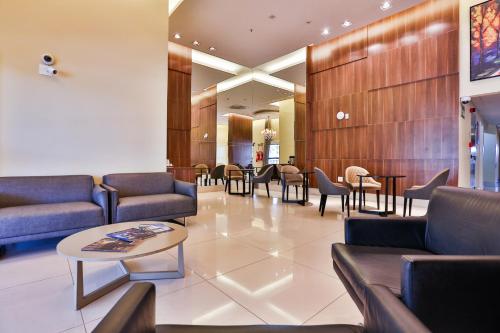 Χώρος καθιστικού στο MG Flats & Residence