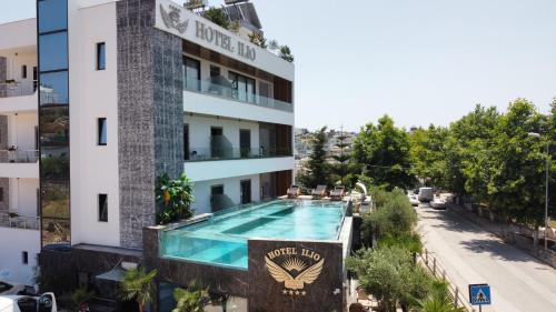 an aerial view of a hotel with a swimming pool at Ilio Boutique Hotel in Ksamil