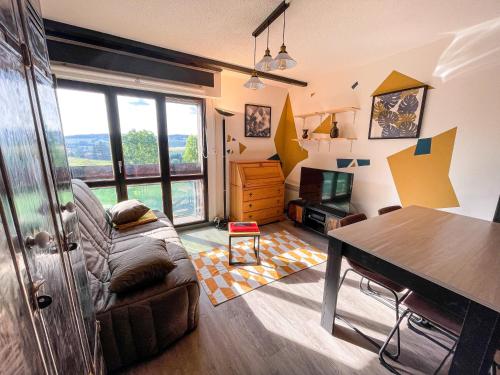 Posedenie v ubytovaní Appartement cosy - Le Chat Gris