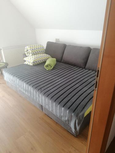 a bed with two pillows on it in a room at Hof Notburga - Erholung, Ruhe & Natur pur in Jakling