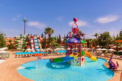 a pool with a water park with a water slide at Rose Aqua Park Hotel in Marrakesh