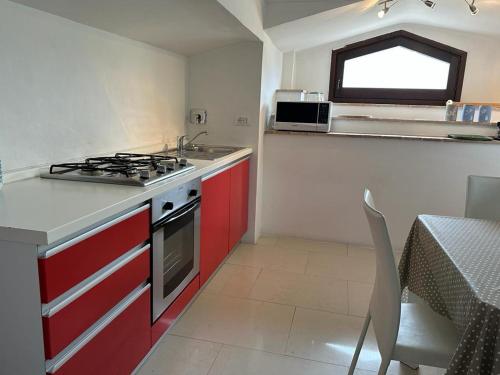 A kitchen or kitchenette at Trilocale in centro storico a Spoleto