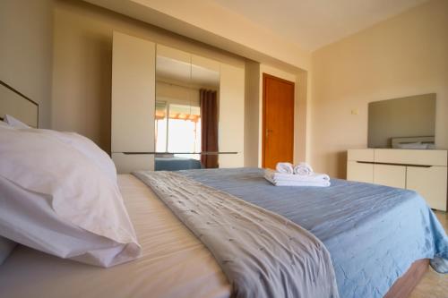 Posteľ alebo postele v izbe v ubytovaní Anelia Villas Sea View