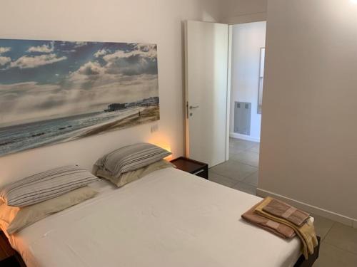 Postel nebo postele na pokoji v ubytování Residence La Nave