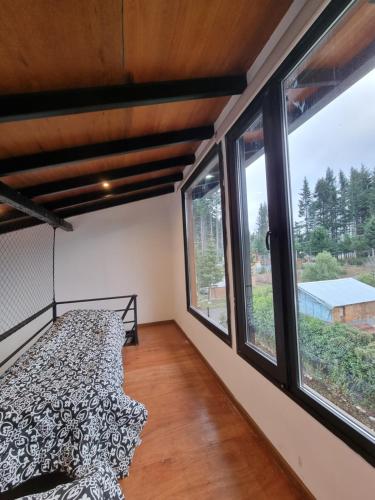 Giường trong phòng chung tại Patagonialiv