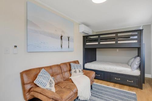 a living room with a couch and a bunk bed at Sandy Toes in Salisbury