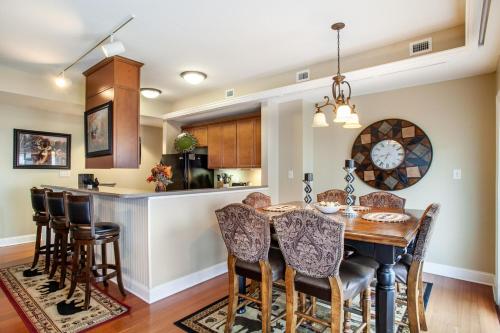 a kitchen and dining room with a table and chairs at Skyline Sanctuary Wrap Around Deck in Gatlinburg