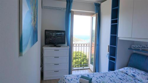 Postel nebo postele na pokoji v ubytování Casa Le Vele by Holiday World