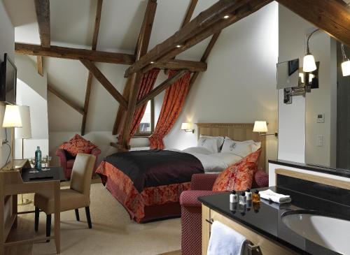 Postel nebo postele na pokoji v ubytování Gut Kump Gastronomie und Hotel