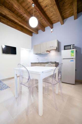 Kuchyň nebo kuchyňský kout v ubytování Case Ruggieri Apartments - Don Leonardo