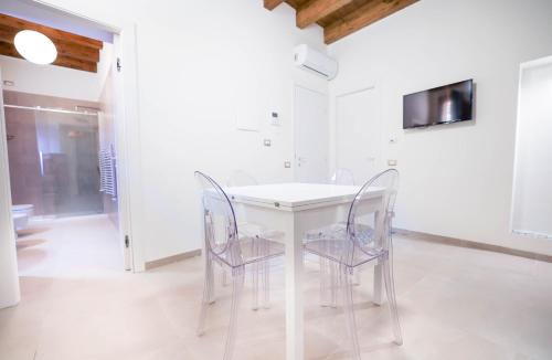 TV a/nebo společenská místnost v ubytování Case Ruggieri Apartments - Don Leonardo