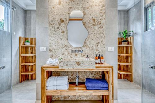 a bathroom with a sink and a shower at Hermosa Waves D2 in Playa Hermosa