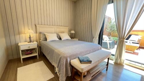 Giường trong phòng chung tại Luxury dúplex Vilamar Denia By El Conserje