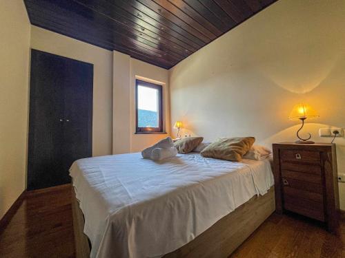 Un pat sau paturi într-o cameră la El Mirador de La Molina